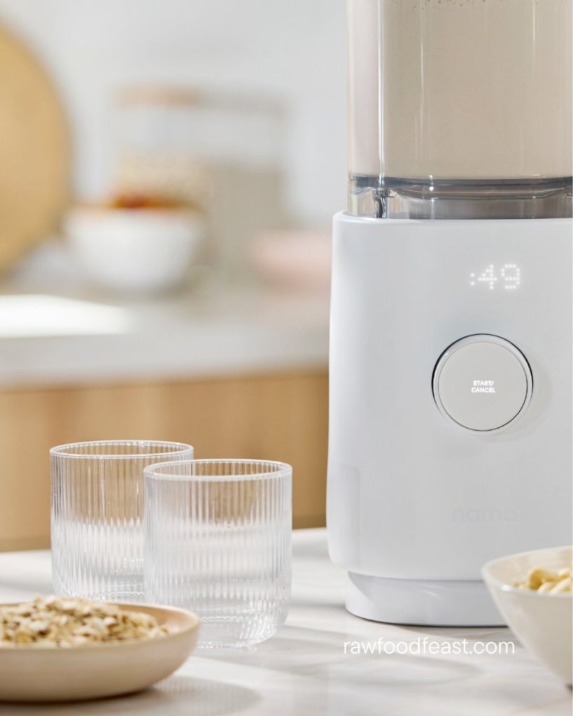 Nama M1 Plant-Based Milk Maker in modern kitchen with fresh plant-based milk ready to serve