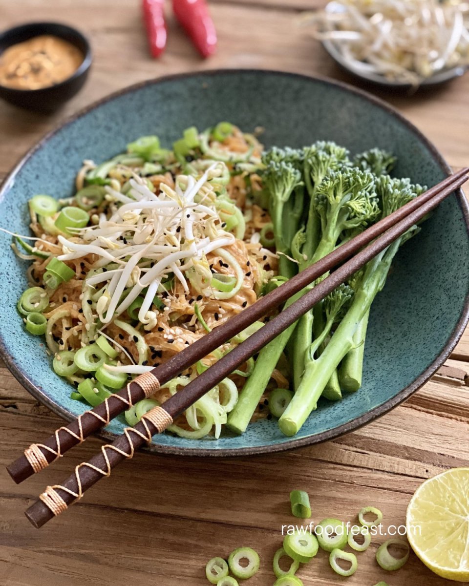 Raw Dan Dan noodles with a bold tahini and Medjool date sauce, pul biber heat, and kelp noodles. Ready in 15 minutes and genuinely worth making every week.