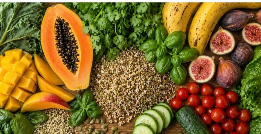 Abundant raw plant foods including leafy greens fruit and sprouts naturally challenging the plant protein myth through whole food variety