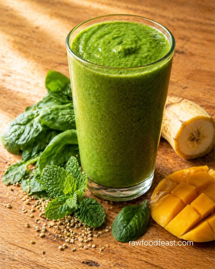 Thick green smoothie with spinach, mint, banana, mango, and hemp seeds — plant protein from whole foods
