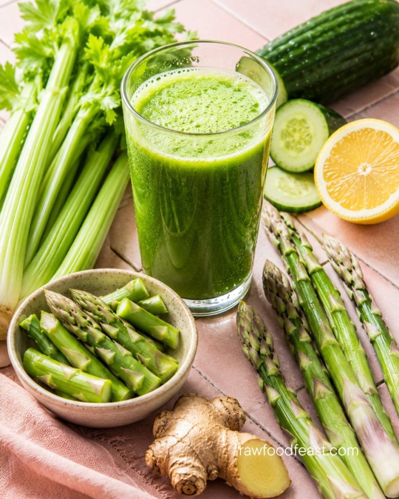 Fresh green juice with raw asparagus, celery, cucumber, lemon and ginger for asparagus gut health benefits