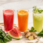 Five colorful fresh-pressed juices for a summer juice reset — green, watermelon, carrot-beet, cucumber-fennel, apple-ginger