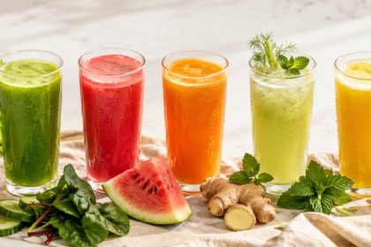 Five colorful fresh-pressed juices for a summer juice reset — green, watermelon, carrot-beet, cucumber-fennel, apple-ginger